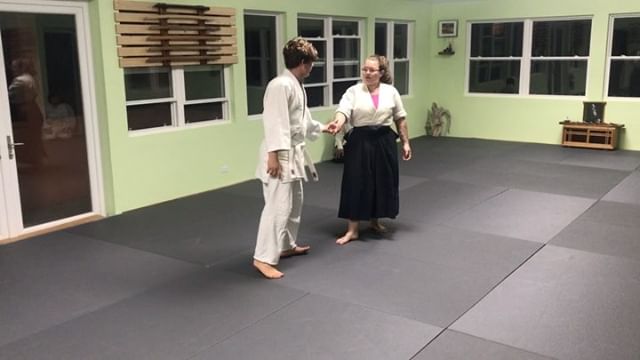 Signe demonstrating Kaiten Nage Ura on Ben during class last night #bermudaaikikai #aikikai  #usafdojo #aikidoaikikai #kaitennage #ukemi #aikidoka #aikidowoman #fundementals