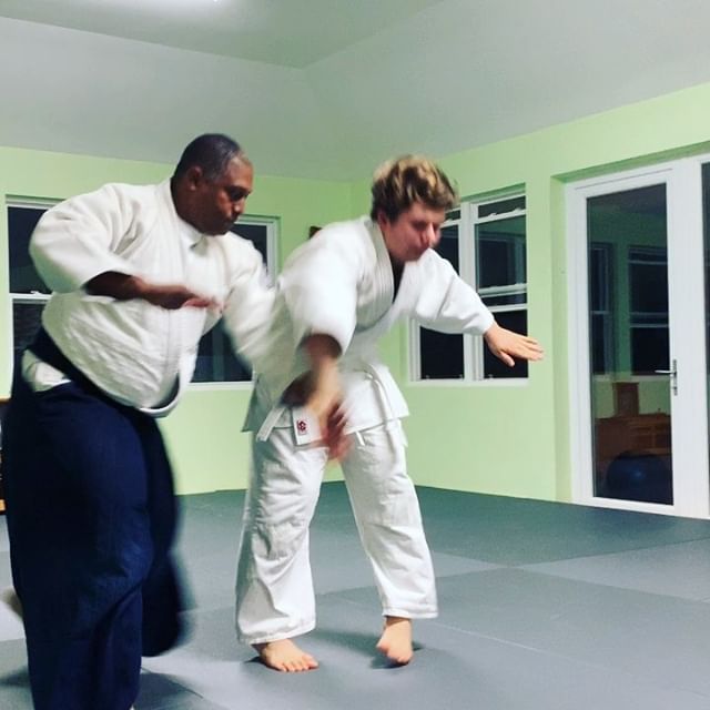 Eugene demonstrates kaiten nage on Ben during Monday nights adult class #aikido #moriheiueshiba #osensei #bermudaaikikai #aikikaiaikido #martialarts #sunset #bermuda #quoteoftheday #usaf