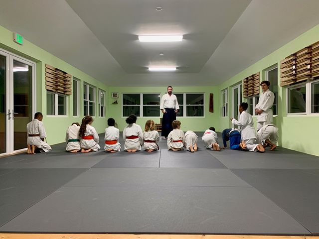 Chris stands tall in the middle of kids class on Monday evening at Bermuda Aikikai, Bermuda’s family martial arts centre for over 30 years. #kids #aikido #moriheiueshiba #osensei #bermudaaikikai #aikikaiaikido #martialarts #sunset #bermuda #quoteoftheday #usaf