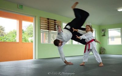 Chris is thrown by a student and also by adult Kim during Saturday mornings kids class. Photos by Roseli