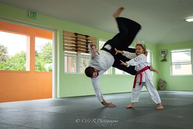 Chris is thrown by a student and also by adult Kim during Saturday mornings kids class. Photos by Roseli