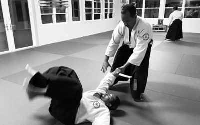 Ari throwing Shaun in class last night #aikidoaikikai #bermudaaikikai #aikido #bermuda #martiaarts #usafdojo #tanto #disarmament #blackandwhitephotography