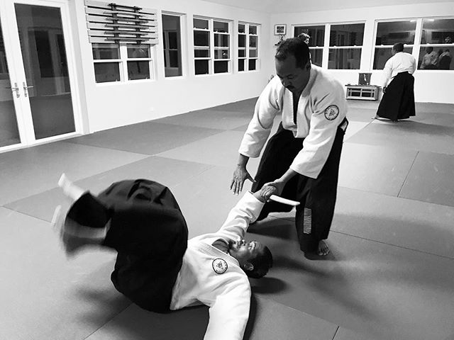 Ari throwing Shaun in class last night #aikidoaikikai #bermudaaikikai #aikido #bermuda #martiaarts #usafdojo #tanto #disarmament #blackandwhitephotography