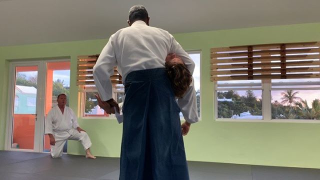 A gorgeous sunset outside the dojo as Sensei Smith demonstrates techniques from tsuki.